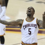 Cleveland Cavaliers guard J.R. Smith (5) celebrates a basket against the Golden State Warriors during the second half of Game 6 of basketball's NBA Finals in Cleveland, Thursday, June 16, 2016. (AP Photo/Ron Schwane)
