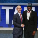 NBA Commissioner Adam Silver, left, poses with Taurean Prince after Prince was selected 12th overall by the Utah Jazz during the NBA basketball draft, Thursday, June 23, 2016, in New York. (AP Photo/Frank Franklin II)