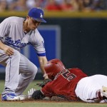 Arizona Diamondbacks' Rickie Weeks (5) slides safely into second base with a double just ahead of the tag by Los Angeles Dodgers' Corey Seager, left, during the fourth inning of a baseball game Wednesday, June 15, 2016, in Phoenix. (AP Photo/Ross D. Franklin)