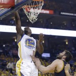 Golden State Warriors forward Harrison Barnes (40) shoots against Cleveland Cavaliers forward Kevin Love during the first half of Game 1 of basketball's NBA Finals in Oakland, Calif., Thursday, June 2, 2016. (AP Photo/Marcio Jose Sanchez)
