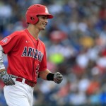 Arizona's Jared Oliva rounds the bases after hitting a two-run home run during the third inning of an NCAA College World Series baseball game against UC Santa Barbara, Wednesday, June 22, 2016, in Omaha, Neb. (AP Photo/Nati Harnik)