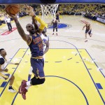 Cleveland Cavaliers' LeBron James (23) drives to the basket against the Golden State Warriors during the first half in Game 1 of basketball's NBA Finals Thursday, June 2, 2016, in Oakland, Calif. (AP Photo/Marcio Jose Sanchez)