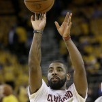 Cleveland Cavaliers guard Kyrie Irving warms up before Game 1 of basketball's NBA Finals between the Golden State Warriors and the Cavaliers in Oakland, Calif., Thursday, June 2, 2016. (AP Photo/Marcio Jose Sanchez)