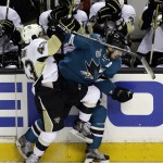 Pittsburgh Penguins' Conor Sheary left, and San Jose Sharks' Logan Couture fight for the puck during the first period of Game 4 of the NHL hockey Stanley Cup Finals, Monday, June 6, 2016, in San Jose, Calif. (AP Photo/Eric Risberg)