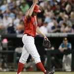 Arizona pitcher Kevin Ginkel reacts to striking out Coastal Carolina's David Parrett in the seventh inning in Game 2 of the NCAA Men's College World Series finals baseball game in Omaha, Neb., Tuesday, June 28, 2016. (AP Photo/Nati Harnik)