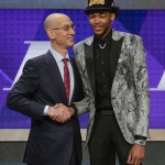 NBA Commissioner Adam Silver shakes hands with Brandon Ingram after the Los Angeles Lakers selected Ingram as the second pick overall during the NBA basketball draft, Thursday, June 23, 2016, in New York. (AP Photo/Frank Franklin II)