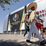 Fans arrive at University of Phoenix Stadium prior to a Copa AmericaGroup C soccer match between Mexico and Uruguay, Sunday, June 5, 2016, in Glendale, Ariz. (AP Photo/Ross D. Franklin)