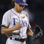 Tampa Bay Rays' Chris Archer tosses the baseball up in the air between pitches against the Arizona Diamondbacks during the first inning of a baseball game Monday, June 6, 2016, in Phoenix. (AP Photo/Ross D. Franklin)