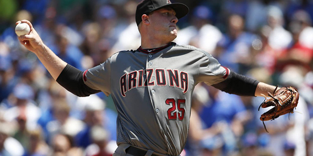 Arizona Diamondbacks starter Archie Bradley throws against the Chicago Cubs during the first inning...
