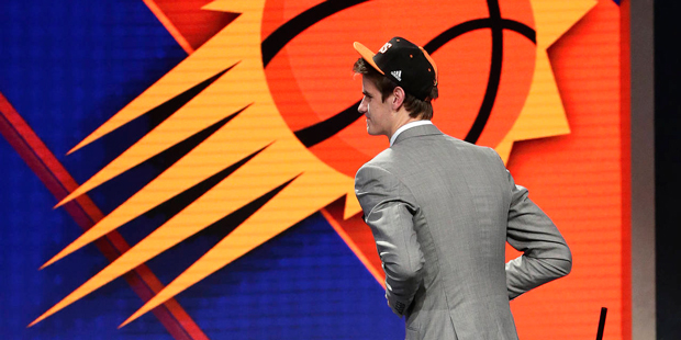 Dragan Bender walks off the stage after being selected fourth overall by the Phoenix Suns during th...