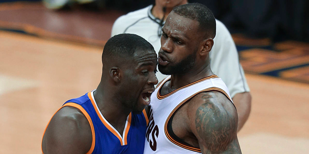 Golden State Warriors forward Draymond Green (23) and Cleveland Cavaliers forward LeBron James (23)...