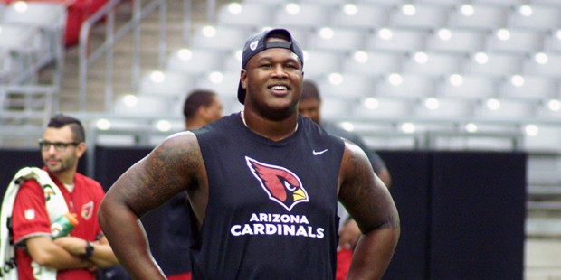 Lineman D.J. Humphries takes a break during the conditioning test at Cardinals training camp July 2...