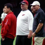 University of Arizona coach Rich Rodriguez chats with Freddie Kitchens during the conditioning test at Cardinals training camp July 28, 2016. (Photo by Adam Green/Arizona Sports)