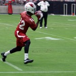 Receiver John Brown makes a catch during training camp July 30. (Photo by Adam Green/Arizona Sports)