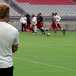 Cardinals safety Tyrann Mathieu watches as his teammates go through the conditioning test at Cardinals training camp July 28, 2016. (Photo by Adam Green/Arizona Sports)