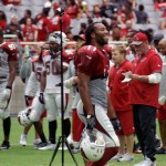Receiver Larry Fitzgerald smiles during training camp on July 31. (Photo by Adam Green/Arizona Sports)