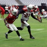 Receiver John Brown begins to separate from cornerback Patrick Peterson during training camp on July 31. (Photo by Adam Green/Arizona Sports)