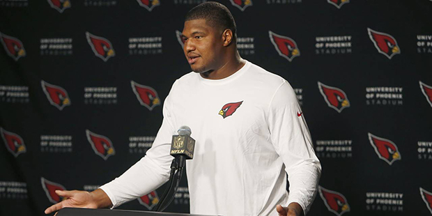 Arizona Cardinals' Calais Campbell speaks to reporters during a news conference after an NFL footba...