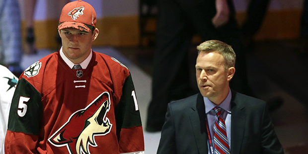 Christian Fischer leaves the arena after being chosen 32nd overall by the Arizona Coyotes during th...