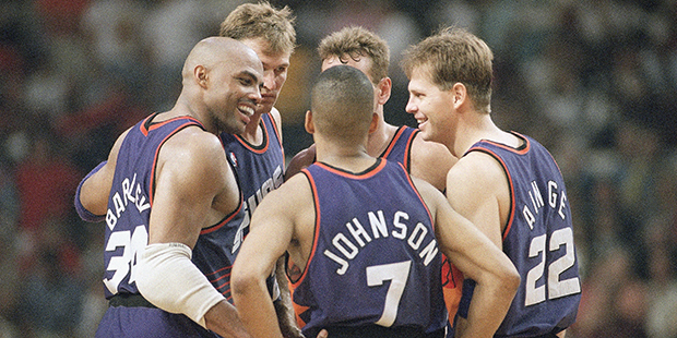 Phoenix Suns players Charles Barkley, left, Kevin Johnson, and Danny Ainge are all smiles as they c...