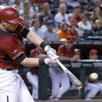 Arizona Diamondbacks' Brandon Drury connects for a two-run home run against the San Diego Padres during the third inning of a baseball game Wednesday, July 6, 2016, in Phoenix. (AP Photo/Ross D. Franklin)