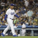 Los Angeles Dodgers manager Dave Roberts approaches the mound to pull relief pitcher Luis Avilan during the seventh inning of a baseball game against the Arizona Diamondbacks, Friday, July 29, 2016, in Los Angeles. (AP Photo/Jae C. Hong)