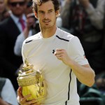 Andy Murray of Britain holds his trophy after beating Milos Raonic of Canada in the men's singles final on day fourteen of the Wimbledon Tennis Championships in London, Sunday, July 10, 2016. (AP Photo/Ben Curtis)