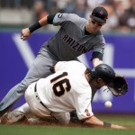 San Francisco Giants' Angel Pagan is struck by the relay throw intended for Arizona Diamondbacks' Nick Ahmed as Pagan steals second base during the third inning of baseball game on Saturday, July 9, 2016, in San Francisco. (AP Photo/D. Ross Cameron)