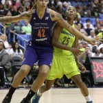 Dallas Wings forward Glory Johnson (25) is blocked by Phoenix Mercury center Brittney Griner (42) during the second half of a WNBA basketball game in Arlington, Texas, Tuesday, July 5, 2016. The Wings won 77-74. (AP Photo/LM Otero)
