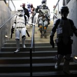 People dressed as "Star Wars" characters leave the field after participating in the annual Star Wars Night before a baseball game between the Los Angeles Dodgers and the Arizona Diamondbacks, Friday, July 29, 2016, in Los Angeles. (AP Photo/Jae C. Hong)