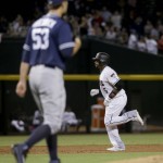 Arizona Diamondbacks' Rickie Weeks Jr. rounds the bases after hitting a three-run home run as San Diego Padres starting pitcher Christian Friedrich (53) walks back to the mound during the third inning of a baseball game, Tuesday, July 5, 2016, in Phoenix. (AP Photo/Matt York)