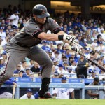 Arizona Diamondbacks' Chris Owings hits an RBI double during the second inning of a baseball game against the Los Angeles Dodgers in Los Angeles, Saturday, July 30, 2016. (AP Photo/Kelvin Kuo)