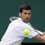 Novak Djokovic of Serbia returns to Sam Querrey of the U.S during their men's singles match on day six of the Wimbledon Tennis Championships in London, Saturday, July 2, 2016. (AP Photo/Alastair Grant)