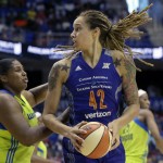 Phoenix Mercury center Brittney Griner (42) is defended by Dallas Wings center Courtney Paris during the first half of a WNBA basketball game in Arlington, Texas, Tuesday, July 5, 2016. (AP Photo/LM Otero)