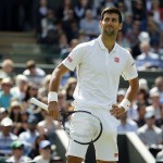 Novak Djokovic of Serbia gestures during his men's singles match against Sam Querrey of the U.S on day six of the Wimbledon Tennis Championships in London, Saturday, July 2, 2016. (AP Photo/Alastair Grant)