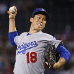 Los Angeles Dodgers' Kenta Maeda, of Japan, throws a pitch against the Arizona Diamondbacks during the first inning of a baseball game Sunday, July 17, 2016, in Phoenix. (AP Photo/Ross D. Franklin)