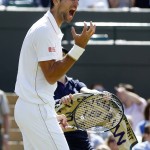 Novak Djokovic of Serbia reacts after losing a point to Sam Querrey of the U.S during their men's singles match on day six of the Wimbledon Tennis Championships in London, Saturday, July 2, 2016. (AP Photo/Alastair Grant)