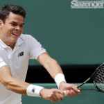 Milos Raonic of Canada returns to Andy Murray of Britain during the men's singles final on the fourteenth day of the Wimbledon Tennis Championships in London, Sunday, July 10, 2016. (AP Photo/Ben Curtis)