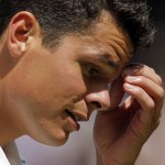 Milos Raonic of Canada wipes his face during the men's singles final against Andy Murray of Britain on the fourteenth day of the Wimbledon Tennis Championships in London, Sunday, July 10, 2016. (Andy Couldridge/Pool Photo via AP)