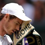Andy Murray of Britain wipes his face during the men's singles final against Milos Raonic of Canada on the fourteenth day of the Wimbledon Tennis Championships in London, Sunday, July 10, 2016. (Andy Couldridge/Pool Photo via AP)