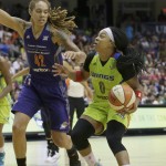 Dallas Wings guard Odyssey Sims (0) drives against Phoenix Mercury center Brittney Griner (42) during the second half of a WNBA basketball game in Arlington, Texas, Tuesday, July 5, 2016. The Wings won 77-74. (AP Photo/LM Otero)