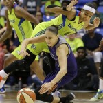 Phoenix Mercury guard Diana Taurasi, right, chases the ball against Dallas Wings guard Skylar Diggins (4) during the second half of a WNBA basketball game in Arlington, Texas, Tuesday, July 5, 2016. The Wings won 77-74. (AP Photo/LM Otero)