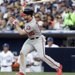 National League's Daniel Murphy, of the Washington Nationals, follows through on a base hit during the seventh inning of the MLB baseball All-Star Game, Tuesday, July 12, 2016, in San Diego. (AP Photo/Gregory Bull)