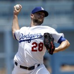 Los Angeles Dodgers starting pitcher Bud Norris throws to the plate against the Arizona Diamondbacks during the first inning of a baseball game in Los Angeles, Sunday, July 31, 2016. (AP Photo/Alex Gallardo)