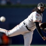 National League's starting pitcher Johnny Cueto, of the San Francisco Giants, throws during the first inning of the MLB baseball All-Star Game, Tuesday, July 12, 2016, in San Diego. (Todd Warshsaw/Pool Photo via AP)