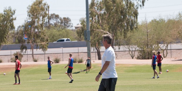 Arizona United head coach Frank Yallop looks on as his team practices for their game Saturday. (Pho...
