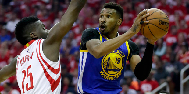 Golden State Warriors guard Leandro Barbosa, right, drives to the basket past Houston Rockets forwa...