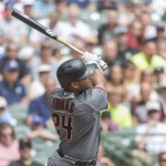 Arizona Diamondbacks' Yasmany Tomas watches his two RBI double hit off of Milwaukee Brewers' Zach Davies during the first inning of a baseball game Thursday, July 28, 2016, in Milwaukee. (AP Photo/Tom Lynn)