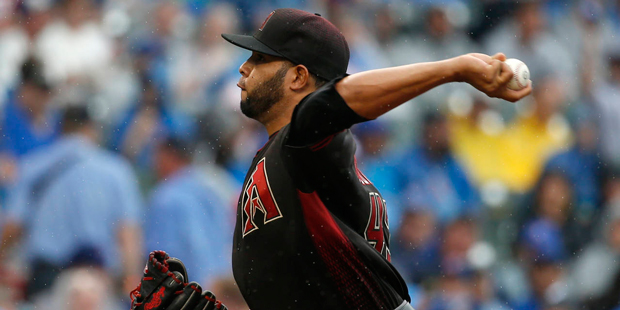 Arizona Diamondbacks starter Edwin Escobar throws against the Chicago Cubs during the first inning ...