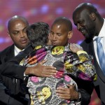 Vice President Joe Biden, left, and former NBA players Charles Barkley, Reggie Miller, and Shaquille O'Neal, right, congratulate Craig Sager as he accepted the Jimmy V award for perseverance at the ESPY Awards at the Microsoft Theater on Wednesday, July 13, 2016, in Los Angeles. (Photo by Chris Pizzello/Invision/AP)